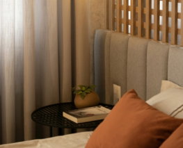 bedroom-with-a-stylish-light-fixture-and-decor-.jpg Bedroom with a stylish light fixture and decor.
